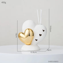 Load image into Gallery viewer, Luxurious Gold heart shaped Statue Romantic Aroma Lamp