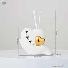 Load image into Gallery viewer, Luxurious Gold heart shaped Statue Romantic Aroma Lamp