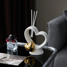 Load image into Gallery viewer, Luxurious Gold heart shaped Statue Romantic Aroma Lamp