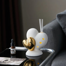 Load image into Gallery viewer, Luxurious Gold heart shaped Statue Romantic Aroma Lamp