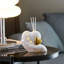 Load image into Gallery viewer, Luxurious Gold heart shaped Statue Romantic Aroma Lamp 
