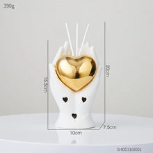 Load image into Gallery viewer, Luxurious Gold heart shaped Statue Romantic Aroma Lamp 
