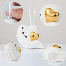 Load image into Gallery viewer, Luxurious Gold heart shaped Statue Romantic Aroma Lamp 
